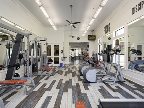 Fitness center with cardio equipment and weights